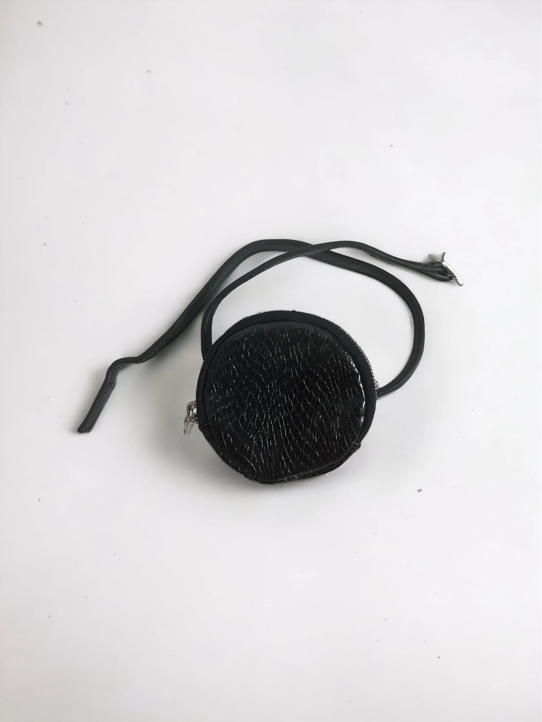 Pochette ronde zippée de LARA NOIR CROCO